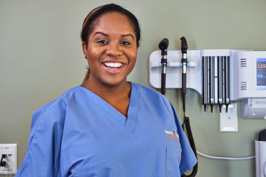 A smiling GoHealth nurse practitioner
