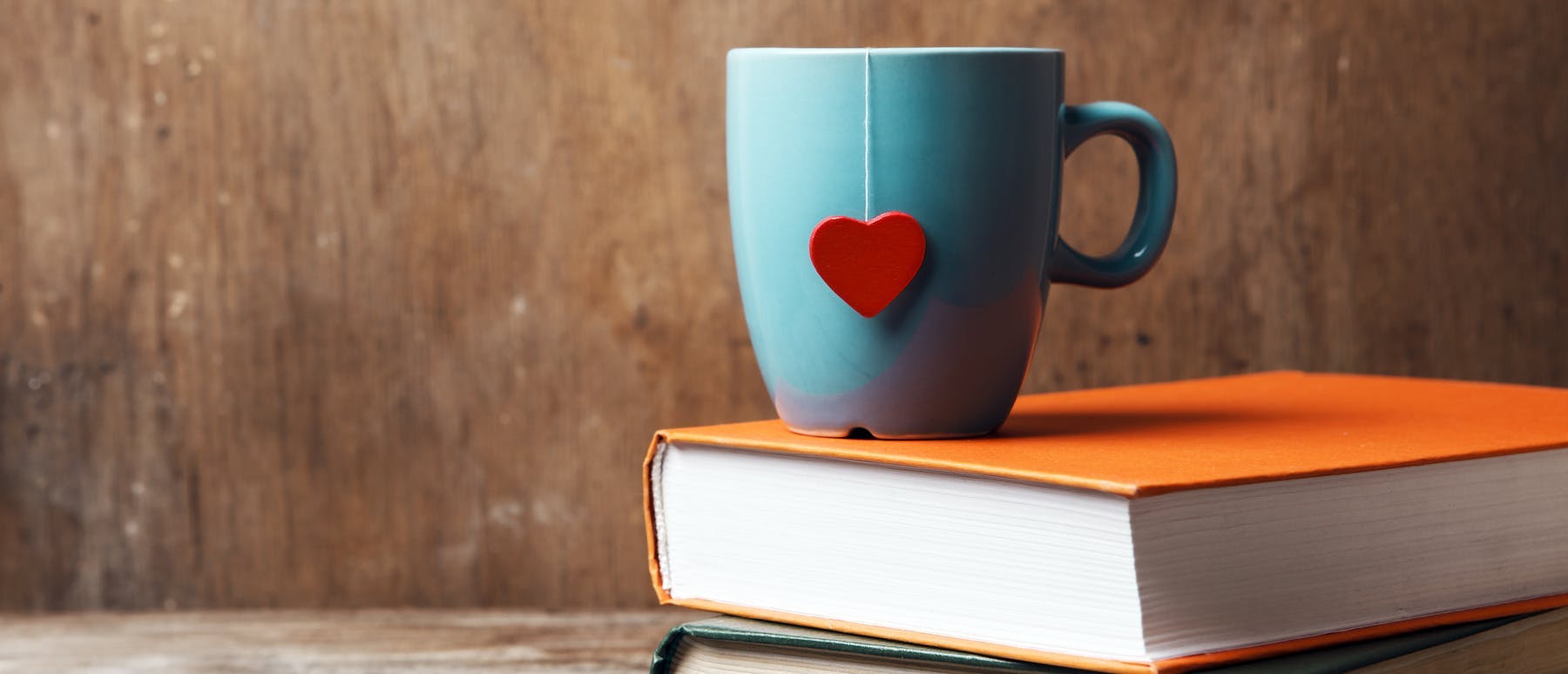 A coffee mug placed on a book